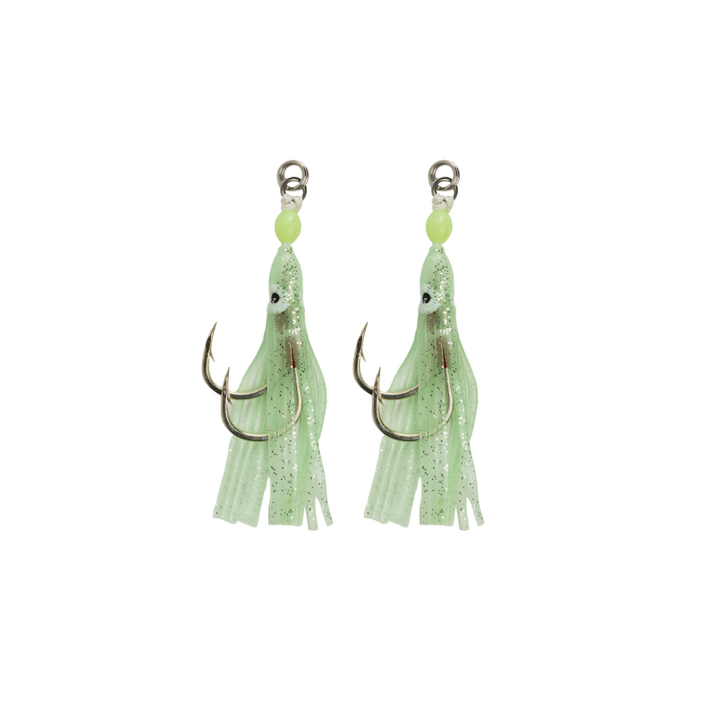 Two green fishing lures with treble hooks on a white background